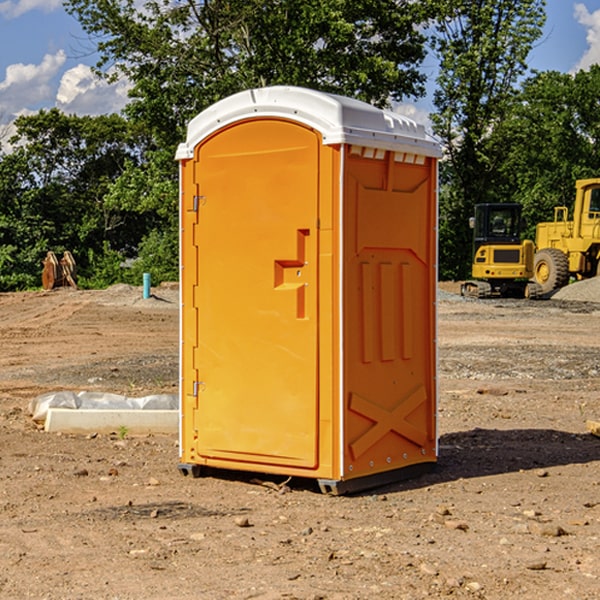 how often are the portable restrooms cleaned and serviced during a rental period in Gilman Illinois